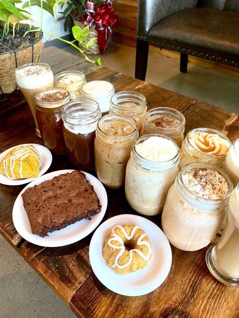 Coffee drinks in mason jars and pastries