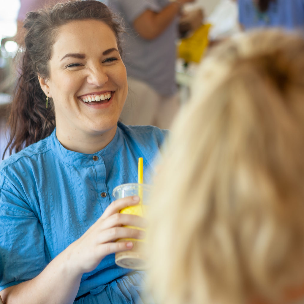 Woman smiling at La La Land Coffee in Dallas