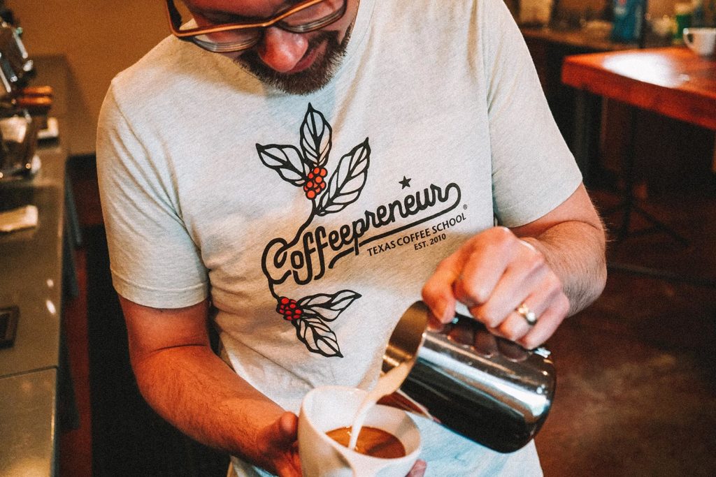 coffeepreneur barista pouring latte art