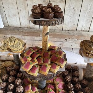 Bakery items on a stand.