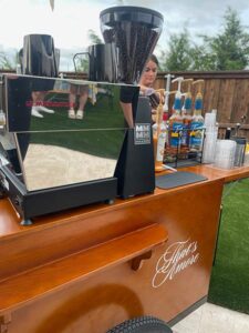Mobile coffee cart business setup serving summer cold brew and matcha drinks with efficient workflow and equipment