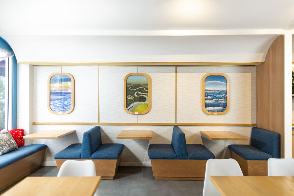 Interior of travel-themed Window Seat Coffee