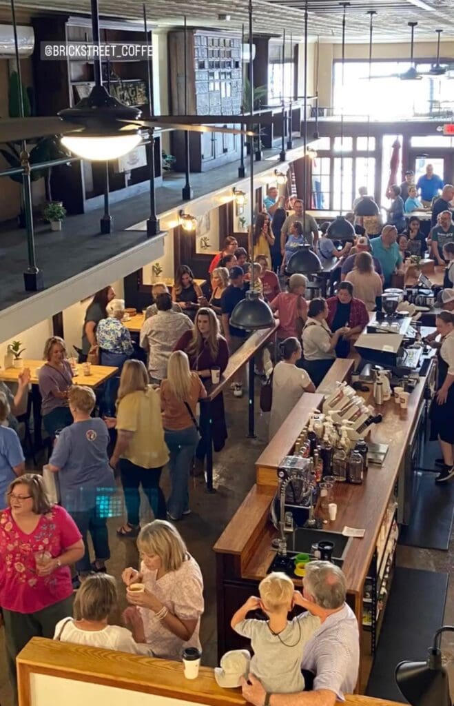 Crowds of people inside Brick Street Coffee